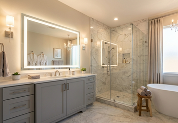 Bathroom renovation project in Chandler featuring double vanity and modern tile design