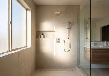 Bathroom remodeling contractor in Chandler installing modern walk-in shower with glass enclosure