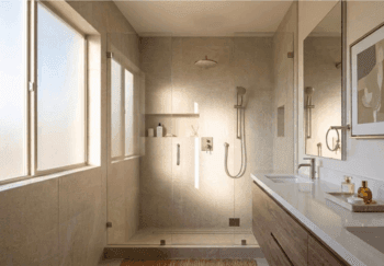 Bathroom remodeling contractor in Chandler installing modern walk-in shower with glass enclosure